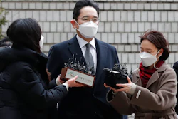 Samsung Electronics Vice Chairman Lee Jae-yong is questioned by reporters upon his arrival at the Seoul High Court, Jan. 18, 2021.