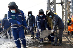In this photo released by China's Xinhua News Agency, rescuers work at the site of a gold mine that suffered an explosion in Qixia in eastern China's Shandong Province, Tuesday, Jan. 12, 2021. Authorities have detained managers at a gold mine in eastern China where more than 20 workers have been trapped underground following an explosion Sunday.