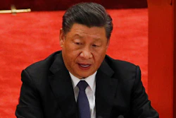 In this Oct. 23, 2020, file photo, Chinese President Xi Jinping delivers his speech at the commemorating conference on the 70th anniversary of the Chinese army entering North Korea to resist the U.S. army, at the Great Hall fo the People in Beijing. Xi is asking former CEO Howard Schultz of Starbucks to help repair U.S.-Chinese relations that have plunged to their lowest level in decades amid a tariff war and tension over technology and security.