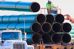 In this May 9, 2015, file photo, workers unload pipes in Worthing, S.D., for the Dakota Access oil pipeline that stretches from the Bakken oil fields in North Dakota to Illinois. A federal appeals court on Tuesday, Jan. 26, 2021, upheld the ruling of a district judge who ordered a full environmental impact review of the Dakota Access pipeline in North Dakota. Following a complaint by the Standing Rock Sioux Tribe, U.S. District Judge James Boasberg said in April 2020 that a more extensive review was necessary than the one already conducted by the U.S. Army Corps of Engineers.