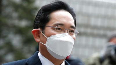 Samsung Electronics Vice Chairman Lee Jae-yong arrives at the Seoul High Court in Seoul, South Korea, Monday, Jan. 18, 2021. Samsung scion Lee will not appeal a court ruling that sentenced him to two and a half years in prison for bribing South Korea's then-president for business favors.