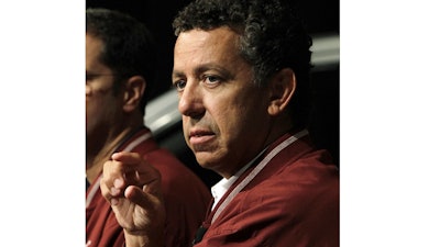 In this July 25, 2011 file photo, Al Iacobelli, former Vice President Employee Relations, Chrysler Group LLC, speaks at Chrysler Group LLC headquarters in Auburn Hills, Mich. A judge on Monday, Jan. 4, 2021, cut 18 months off a 5 1/2-year prison sentence for the former Fiat Chrysler executive who with union members looted a training center for auto workers. Iacobelli's sentence reduction was a bit larger than prosecutors had requested in rewarding him for cooperation in an investigation of corruption at the highest levels of the United Auto Workers. He admitted to showering more than $1.5 million in cash and gifts on high-ranking members of the union to gain an advantage during negotiations, including a $262,000 mortgage payoff.