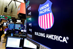 In this Sept. 13, 2019, file photo the logo for Union Pacific appears above a trading post on the floor of the New York Stock Exchange. A federal judge has blocked one of Union Pacific's main unions from going on strike over its concerns about the railroad's efforts to protect employees from the coronavirus. Judge Brian Buescher ruled Thursday, Jan. 7, 2021 that the union must address its concerns through contract talks with the railroad and it doesn't have the right to strike now.