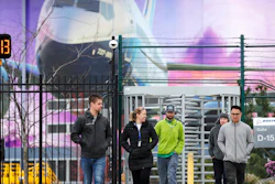 Workers exit a gate at Boeing's airplane manufacturing plant in Renton, Wash., March 23, 2020.