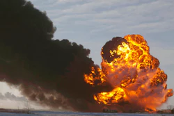 A fireball goes up at the site of an oil train derailment near Casselton, N.D., Dec. 30, 2013.