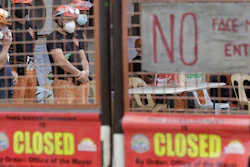 Rescuers stand inside the compound of the TP Marcelo Ice Plant in Navotas, Philippines. An ammonia leak from the ice plant in the Philippine capital region left some dead and more than 90 injured or sickened.