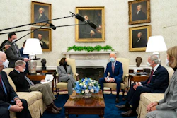 President Joe Biden speaks during a meeting with lawmakers on investments in infrastructure, in the Oval Office of the White House, Thursday, Feb. 11, 2021, in Washington. From left, Sen. Ben Cardin, D-Md., Sen. Jim Inhofe, R-Okla., Vice President Kamala Harris, Biden, Sen. Tom Carper, D-Del., and Sen. Shelley Moore Capito, R-W.Va.