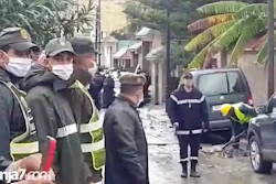 In this image made from video provided by Tanja 7, firefighters and emergency workers at the scene of flooding in Tangier, Morocco, Monday, Feb, 8 2021.
