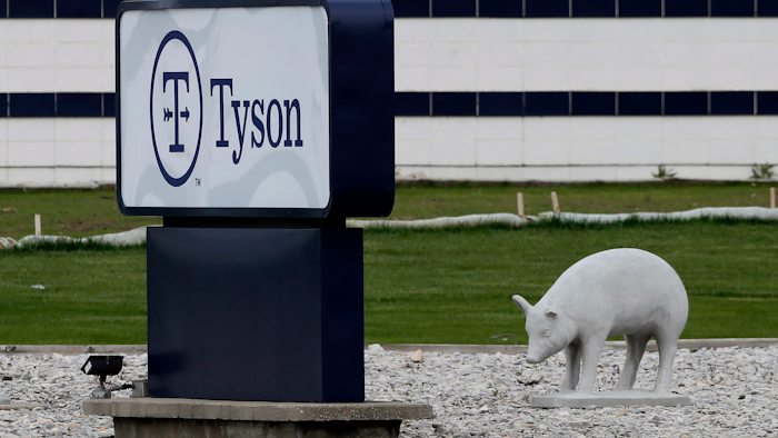 In this May 1, 2020 photo, a sign sits in front of the Tyson Foods plant in Waterloo, IA.