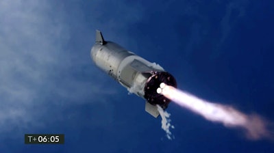 In this image from video made available by SpaceX, one of the company's Starship prototypes fires its thrusters as it lands during a test in Boca Chica, Texas, on Wednesday, March 3, 2021. SpaceX’s futuristic Starship looked like it aced a touchdown Wednesday, but then exploded on the landing pad with so much force that it was hurled into the air. The failure occurred just minutes after SpaceX declared success.