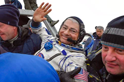 Ground personnel carry NASA astronaut Mark Vande Hei after landing in Kazakhstan, Feb. 28, 2018.