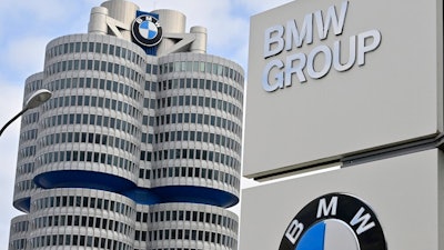 The BMW Group headquarters are pictured in Munich, Germany, Wednesday, March 16, 2021. German automaker BMW said Wednesday it intends to speed up the rollout of new electric cars, vowing to bring battery powered models to 50% of global sales by 2030.