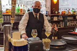 Bartender Dino Keres prepares drinks at Sam’s Grill in San Francisco.