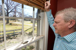 GM autoworker Matt Moorhead looks out his window in Warren, Ohio.