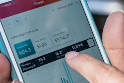 Ivet Cantu, 45, points to her electricity bill from Griddy Energy on an app showing her energy cost of $3,114.27, during recent severe cold weather outside of her home in Dallas.