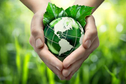 Hands Holding Green Globe With Grassy Background 453897319 1987x1512 1 6048d8f724bf3