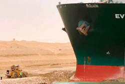 In this photo released by the Suez Canal Authority, a cargo ship, named the Ever Green, sits with its bow stuck into the wall.