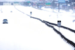 In this Feb. 15, 2021, file photo, traffic is sparse on the snow-covered Interstate 45 near The Woodlands Parkway following an overnight snowfall in The Woodlands, Texas. Temperatures plunged into the teens Monday with light snow and freezing rain.