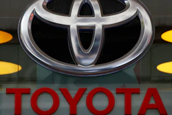 The Toyota logo is displayed at their shop on the Champs Elysees Avenue in Paris.