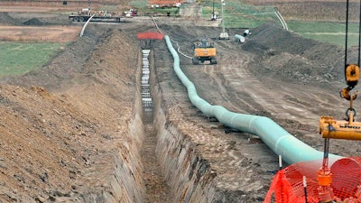 In this October 2016 file photo, construction continues on the Dakota Access pipeline. A hearing was scheduled for Friday, April 9, 2021, to determine whether the Dakota Access oil pipeline should be allowed to continue operating without a key permit while the U.S. Army Corps of Engineers conducts an environmental review on the project.