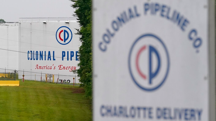 In this May 12, 2021, file photo, the entrance of Colonial Pipeline Company in Charlotte, N.C. U.S. pipeline operators will be required for the first time to conduct a cybersecurity assessment under a Biden administration directive to be issued Thursday in response to the ransomware hack that disrupted gas supplies in several states this month.