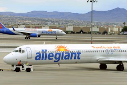 Allegiant Air jets taxi at McCarran International Airport in Las Vegas, May 9, 2013.
