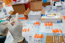 A Northwell Health registered nurses fills a syringe with the Johnson & Johnson COVID-19 vaccine, Albanian Islamic Cultural Center, Staten Island, New York, April 8, 2021.