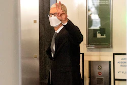 Apple CEO Tim Cook leaves the Ronald V. Dellums building, Oakland, Calif., May 21, 2021.
