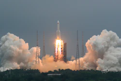 In this April 29, 2021, file photo released by China's Xinhua News Agency, a Long March 5B rocket carrying a module for a Chinese space station lifts off from the Wenchang Spacecraft Launch Site in Wenchang.