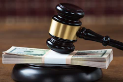 Mallet Being Hit On Dollar Bundle In Courtroom 611175622 5617x3749