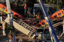Subway cars dangle at an angle from a collapsed elevated section of the metro Number 12 Line, in Mexico City, Tuesday, May 4, 2021.
