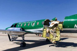This image from CBS Denver shows a Key Lime Air Metroliner that landed safely at Centennial Airport after a mid-air collision near Denver on Wednesday, May 12, 2021. Federal officials say two airplanes collided but that there are no injuries. The collision between a twin-engine Fairchild Metroliner and a single-engine Cirrus SR22 happened as both planes were landing, according to the National Transportation Safety Board. Key Lime Air, which owns the Metroliner, says its aircraft sustained substantial damage to the tail section but that the pilot was able to land safely.