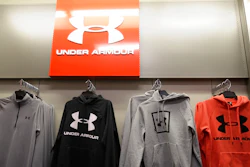 In this Nov. 29, 2019, file photo Under Armour clothes are displayed at a Kohl's store in Colma, Calif. Sportswear company Under Armour has settled with the Securities and Exchange Commission to pay $9 million in fines related to misleading its revenue growth to investors from the third quarter of 2015 through the fourth quarter of 2016, the agency said Monday, May 3, 2021.