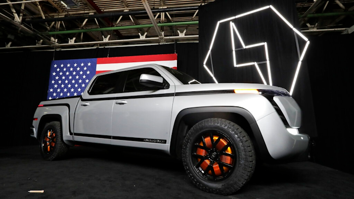 In this Thursday, June 25, 2021, file photo, the electric Endurance pick-up truck is on display at Lordstown Motors Corporation, in Lordstown, Ohio. Startup commercial electric vehicle maker Lordstown Motors says it may not be in business a year from now as it tries to secure funding to start full production of an electric pickup truck. In a quarterly regulatory filing released Tuesday, June 8, 2021, Lordstown says the $587 million it had on hand as of March 31 isn’t enough to start commercial production and begin selling the truck.