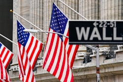 American flags hang outside of the New York Stock Exchange, in this Feb. 16, 2021 photo.