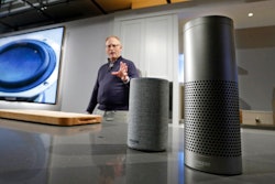 David Limp, senior vice president of Devices and Services at Amazon, displays a new Echo, left, and an Echo Plus during an event announcing several new Amazon products by the company, Wednesday, Sept. 27, 2017, in Seattle. On Tuesday, June 8, 2021 Amazon launched a program that forces users of many Echo smart speakers and Ring security cameras to automatically share a small portion of their wireless bandwidth with neighbors. The only way to stop it is to turn it off yourself.