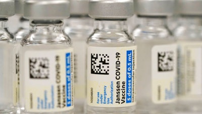 This Saturday, March 6, 2021 file photo shows vials of Johnson & Johnson COVID-19 vaccine at a pharmacy in Denver. On Thursday, June 10, 2021, Johnson & Johnson said that the U.S. Food and Drug Administration extended the expiration date on millions of doses of its COVID-19 vaccine by an extra six weeks.