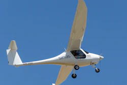 A Pipistrel Sinus VH-YAD ultralight aircraft taking off from Lethbridge airfield, Lethbridge, Australia, Nov. 2014.