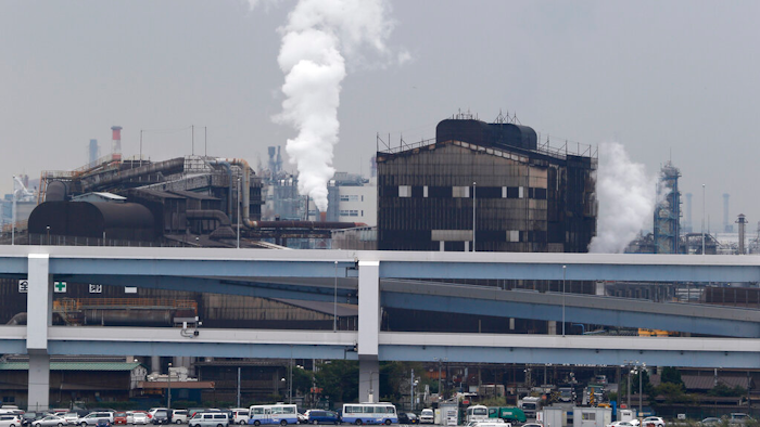 Smoke billows from an oil refinery in Kawasaki, Tokyo, Oct. 21, 2013.