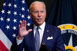 President Joe Biden finishes leaves after speaking during a visits to the Office of the Director of National Intelligence in McLean, VA on Tuesday, July 27.