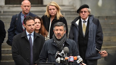 Ian Hockley, father of Dylan Hockley, one of the children killed in the 2012 Sandy Hook shooting, addresses the media after a hearing before the state Supreme Court in Hartford, Conn., Nov. 14, 2017.