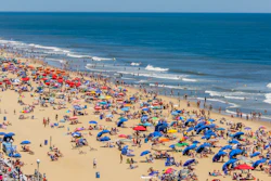 The drones take photos and run them through a software that counts how many civilians are occupying the beach.