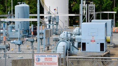 In this May 11, 2021 file photo, a Colonial Pipeline station is seen in Smyrna, Ga., near Atlanta. The Department of Homeland Security has announced new requirements for U.S. pipeline operators to bolster cybersecurity following a May ransomware attack that disrupted gas delivery across the East Coast.