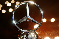 In this Feb. 5, 2015 file photo the logo of a Mercedes car is photographed during an annual press conference of Daimler AG in Stuttgart, Germany.