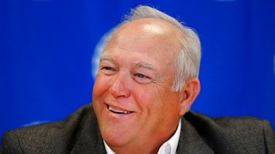 In a Feb. 16, 2017 file photo, United Auto Workers president Dennis Williams speaks with reporters in Detroit. The United Auto Workers union says it got $1.1 million for a lakefront house in northern Michigan that was being built for the former president who was sentenced to prison in a federal corruption probe. Cabin 4 at a UAW conference center on Black Lake was being built for Williams, who who retired in 2018 and in May was sentenced to 21 months in prison in an embezzlement scandal. The property in rural Cheboygan County was originally listed at $1.3 million. The union said it closed on the sale Friday. Spokesman Brian Rothenberg said he would check to see if the union covered its costs with the sale. Money will go to the union's General Fund, he said. “This sale rights a wrong from the past, and I want each and every one of you to know that we continue to implement ethics reforms throughout the organization,” new President Ray Curry wrote in a note to members Tuesday, July 27, 2021.