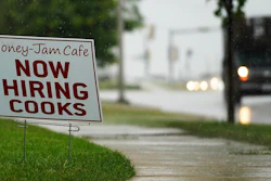 A hiring sign is shown in Downers Grove, Ill., Thursday, June 24, 2021. The number of Americans collecting unemployment benefits slid last week, another sign that the job market continues to recover rapidly from the coronavirus recession.