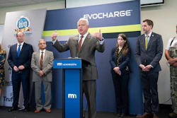 Minnesota Gov. Tim Walz speaks during a news conference after touring Phillips & Temro in Eden Prairie, Minn. Monday, July 26, 2021. Minnesota became the first Midwestern state to adopt a plan for encouraging the switchover to electric vehicles, as Gov. Walz predicted that someday people will wonder why there was such as fuss.