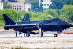 Hidden under tarpaulin, a prospective Russian fighter jet is being towed to a parking spot before its presentation at the Moscow international air show in Zhukovsky outside Moscow, Russia, Thursday, July 15, 2021. Russian aircraft makers say they will present a prospective new fighter jet at a Moscow air show that opens next week. The new warplane hidden under tarpaulin was photographed being towed to a parking spot across the airfield in Zhukovsky outside Moscow. That's where MAKS-2021 International Aviation and Space Salon opens on Tuesday. Russian President Vladimir Putin is set to visit the show’s opening.