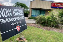 A hiring sign is displayed at Firestone Complete Auto Care store in Arlington Heights, Ill., Wednesday, June 30, 2021.