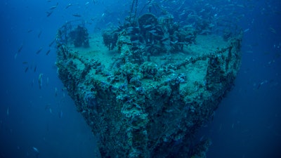 The bow of the wrecked steamship Vis with shoal of fish. The wreck lies in the Croatian Adriatic sea. The ship was sunk after hitting a mine just after the end of WW2.